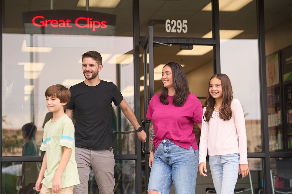 Family leaving a Great Clips salon anxiety free